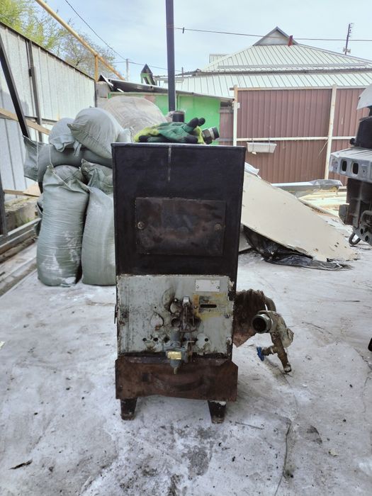 Продам газовую печь отопления