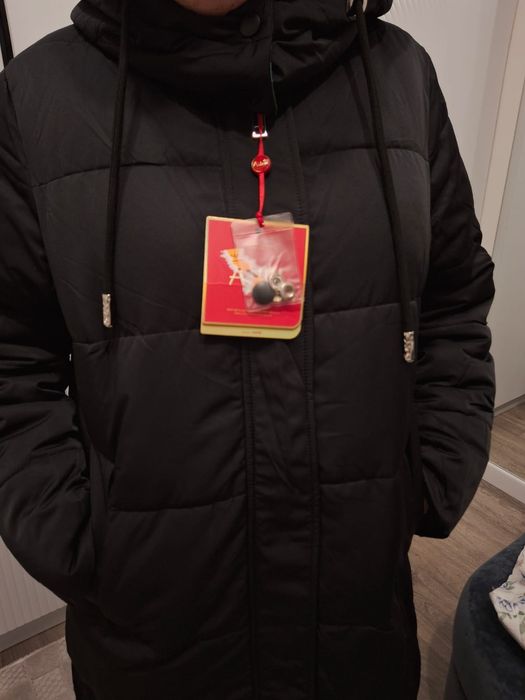 Продам пуховик женский