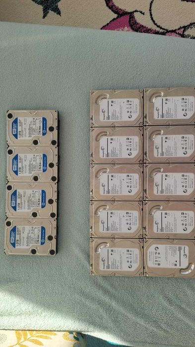 HDD-uri Seagate 2Tb și Western Digital 1Tb, SSD Kingston și memorie RAM