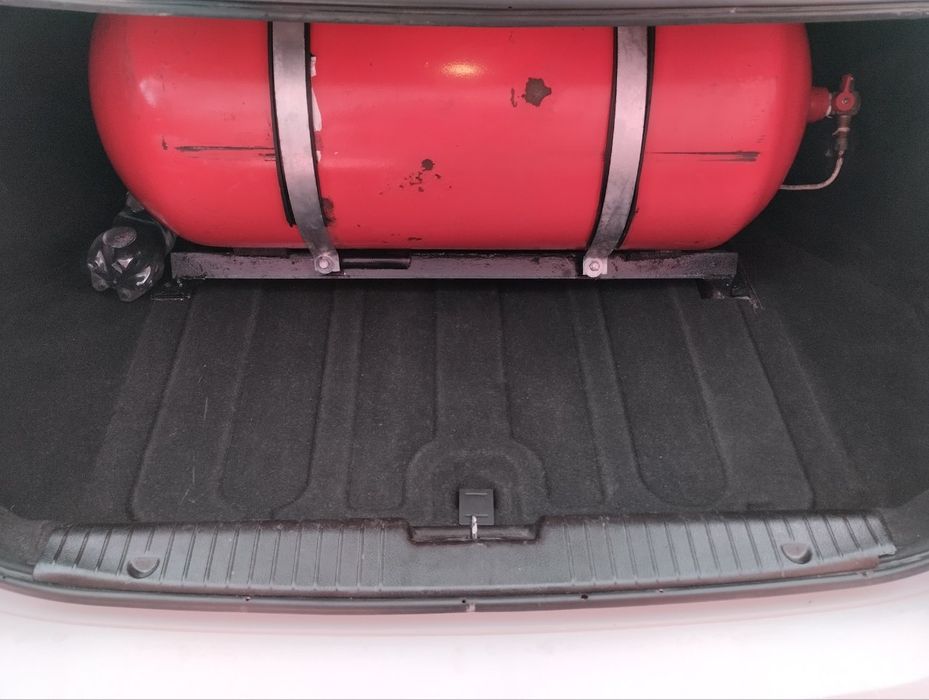 Lacetti 1.8 1 pozitsiya Gaz-benzin 2012  yil