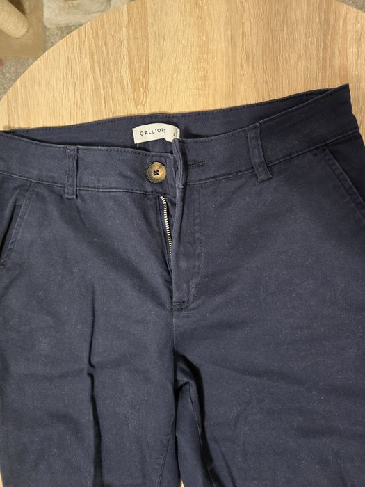 Vand pantaloni eleganți