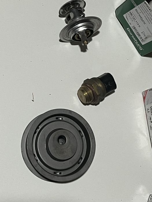 Голф 3 ролик натижителья и термостат