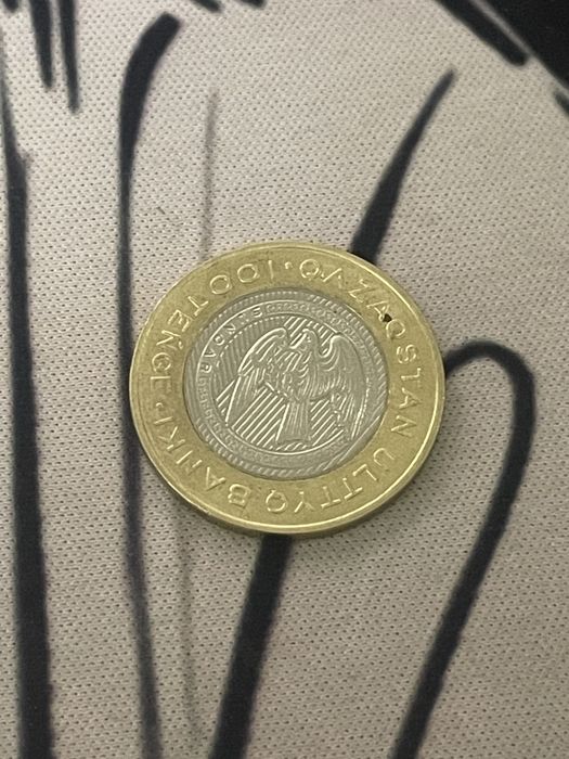 Монета 100 тенге