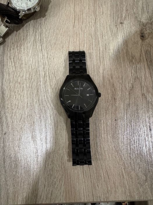 Часы марки Bulova черный цвет черный циферблат б/у