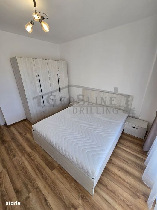 Apartament 2 dormitoare 1 open-space Parcare subterană privată inclusă