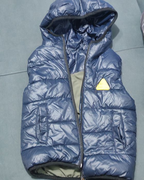 Жилетка безрукавка