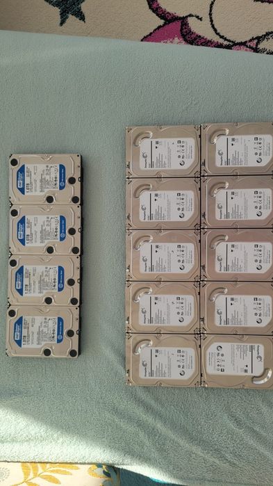 HDD-uri Seagate 2Tb și Western Digital 1Tb, SSD Kingston și memorie RAM