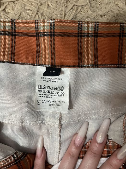 брюки клетчатые