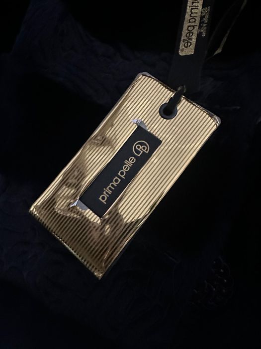 Шуба из каракуля новое