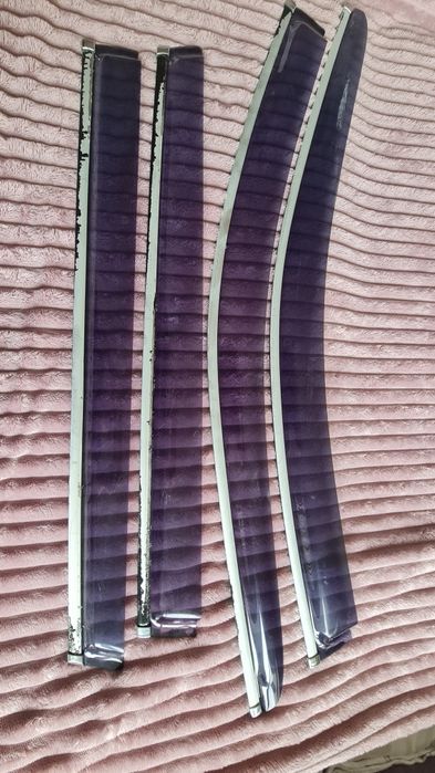 Продам дефлекторы боковых окон  Subaru outback оригинал б/у