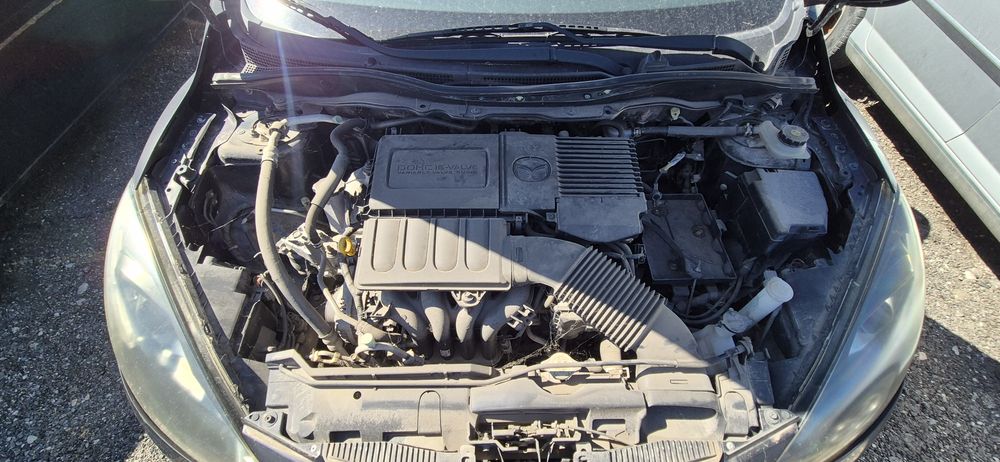Мазда 2  1.4 бензин 70hp 2008г