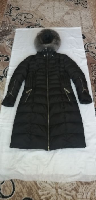 Продам женский пуховик