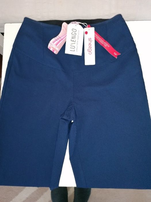 Нов стилен оформящ панталон за дами с извивки.