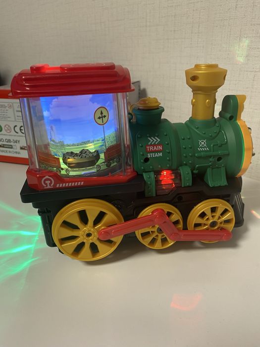 Детски музикален локомотив с пушек, светлини и въртящи се картинки