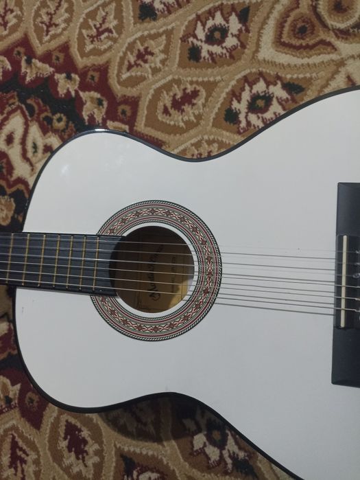 Gitara karopka upakofka holatda