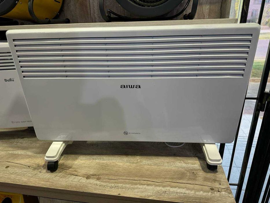 Электрический обогреватель от бренда Aiwa.