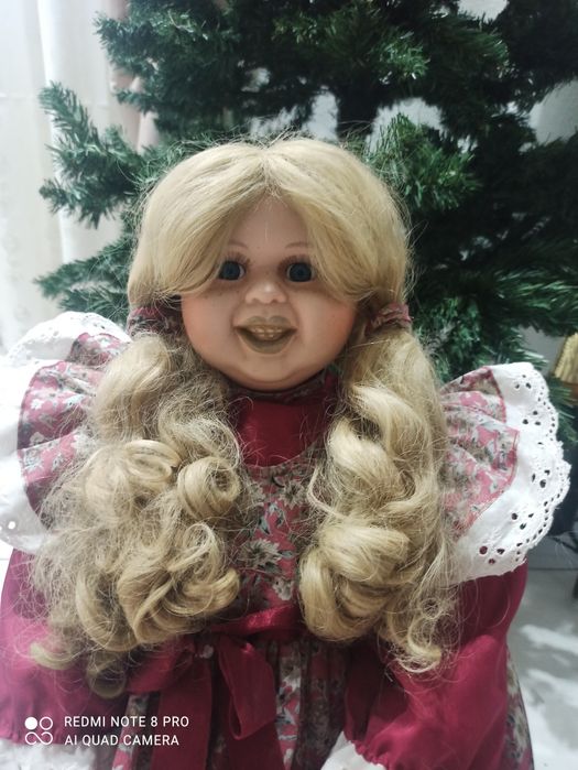 Papusa de portelan articulada