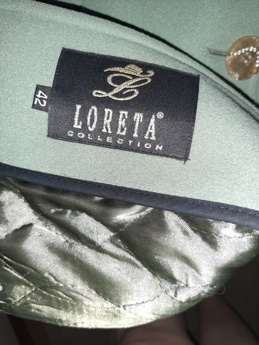 Palto sotiladi. Xolati alo darajada.