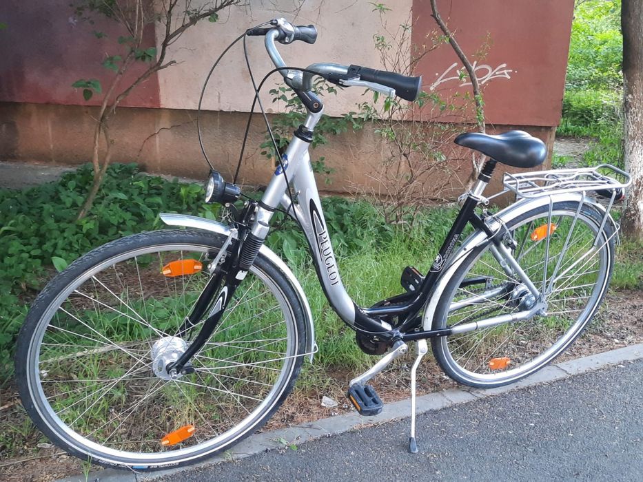 Vând bicicleta de dama marca PEUGEOT mărime roti  de 28.