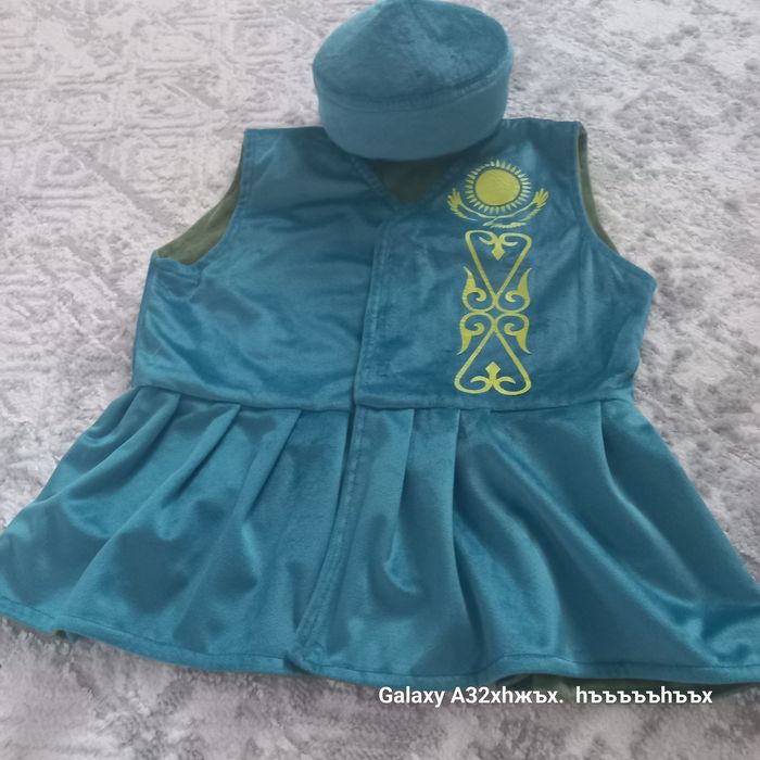 ұлттық жакеттер тақиясымен