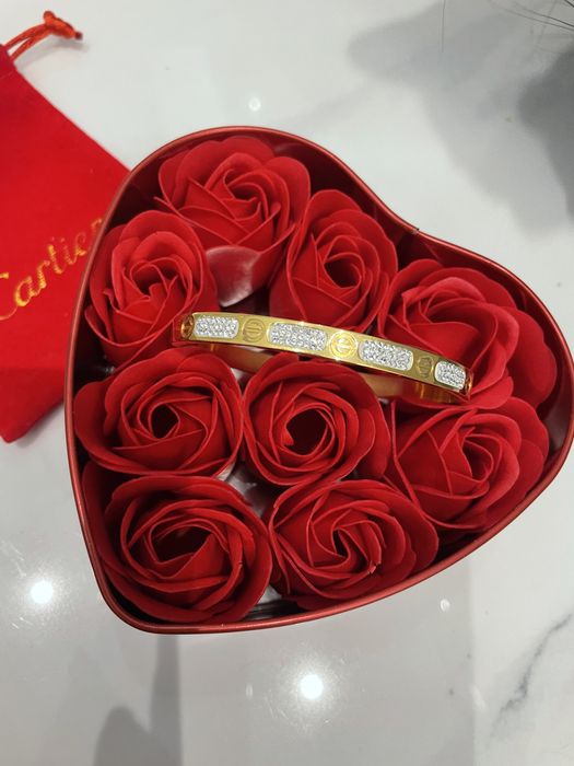 Гривни Cartier, Louis Vuitton, Gucci, Versace