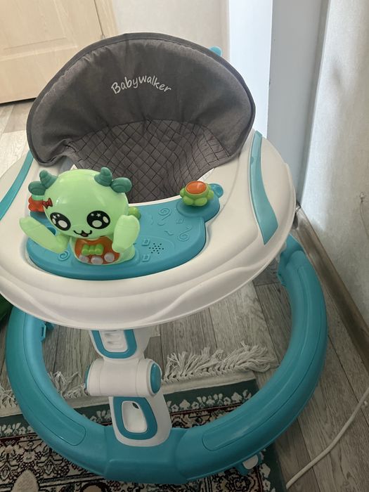 Продам детский ходунок новый