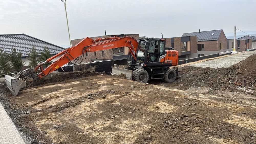 Excavator pe roti de inchiriat,sapaturi,demolari.