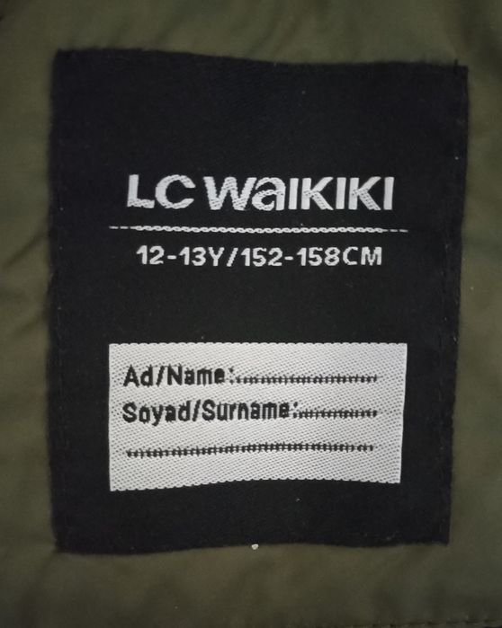 Пуховик с капюшоном 12-14 лет