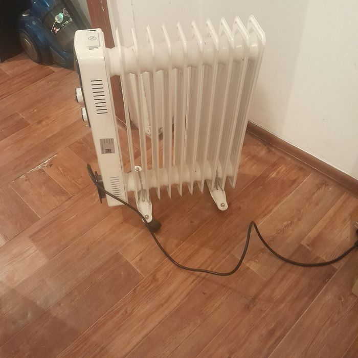 Маслянный обогреватель