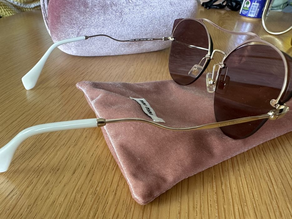 Слънчеви очилаMiu Miu