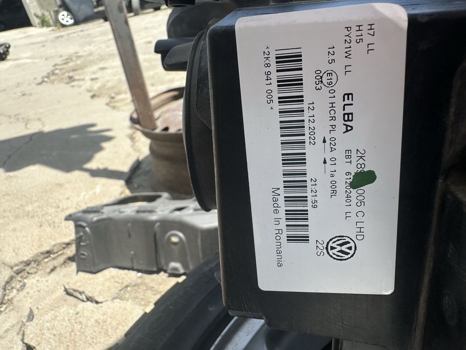 Vw Caddy 22г ляв фар оригинален