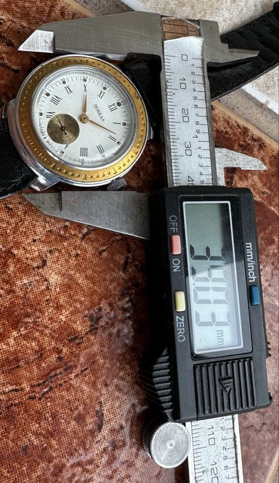 Руски  механичен часовник Победа,направен в 90 години.