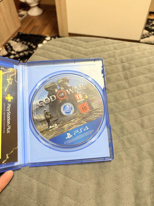 Vând god of war day one edition