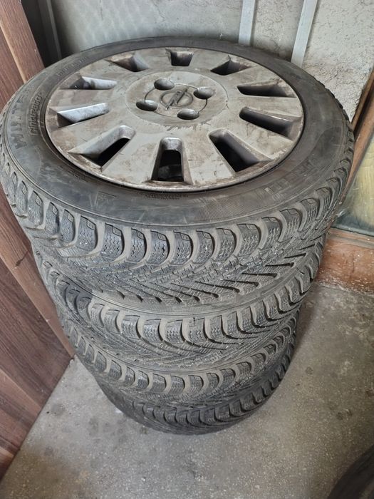 Set 4 roți Opel cu jante originale + anvelope de iarnă 185/55 R15 – 1.200 lei negociabil