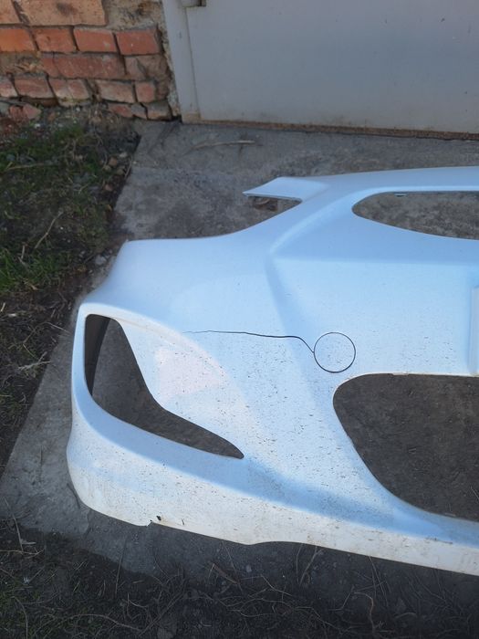 Бампер с ришоткой б.у