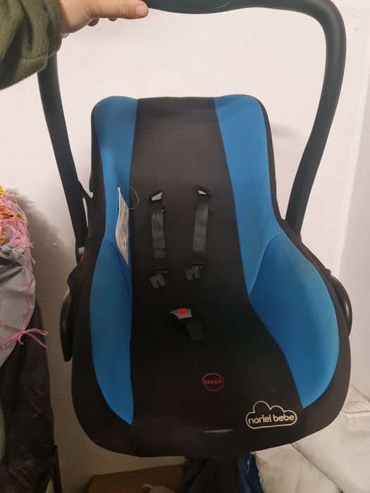 Scoica auto bebe, copil mic bebelus, scaun masina Noriel Bebe
