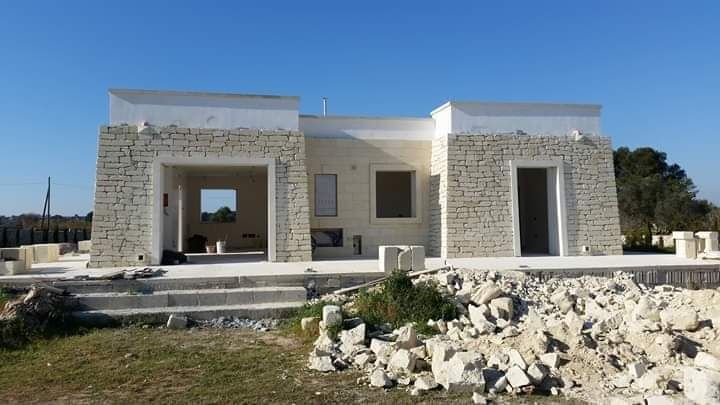 Fac zidărie cu piatră masivă