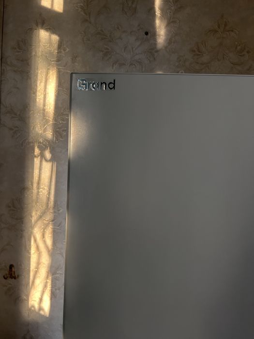 Новый холодильник.