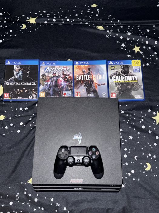 PS 4 Pro + Controller + 4 Jocuri