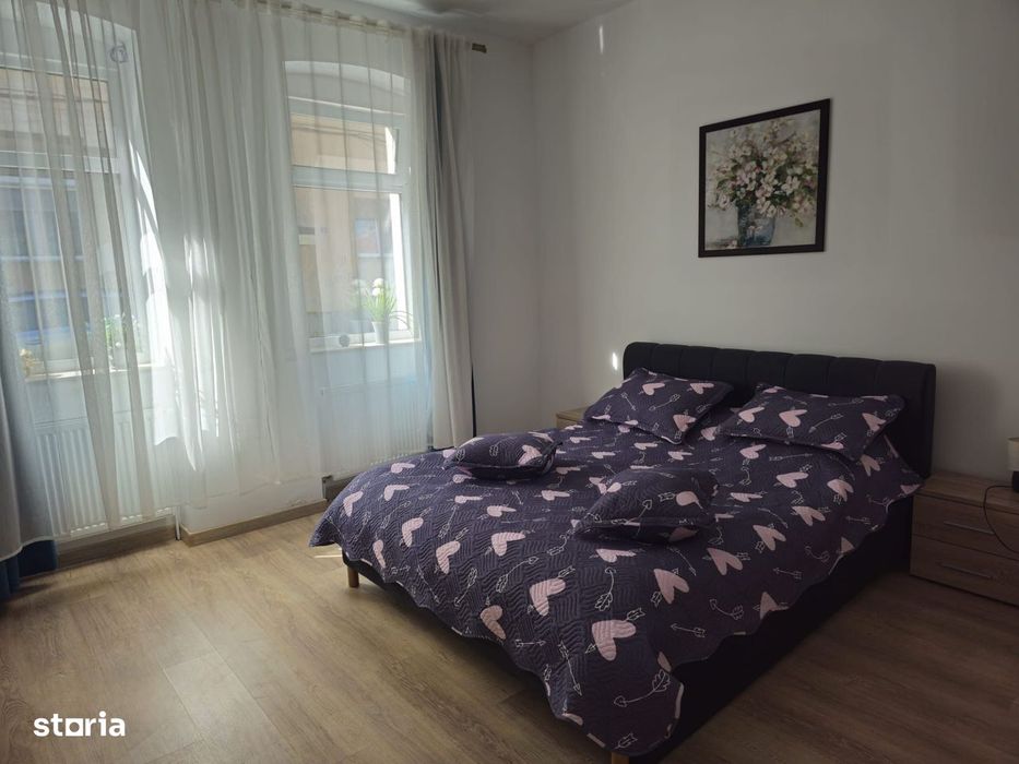 Casa finisata la curte comuna, 56 mp, 2 camere - zona Centrala