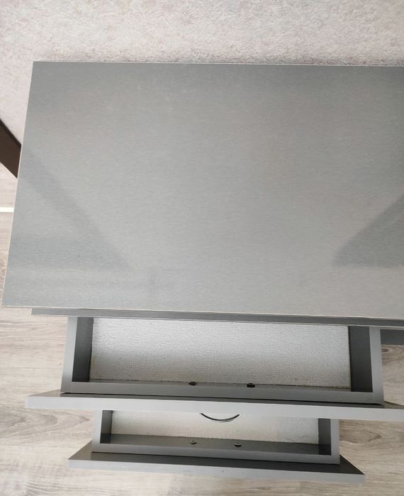 Продаётся тумба под телевизор в стиле хай-тек. Стального цвета.