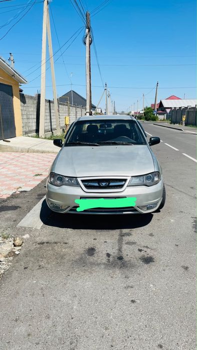 Машина Нексиа Дуо