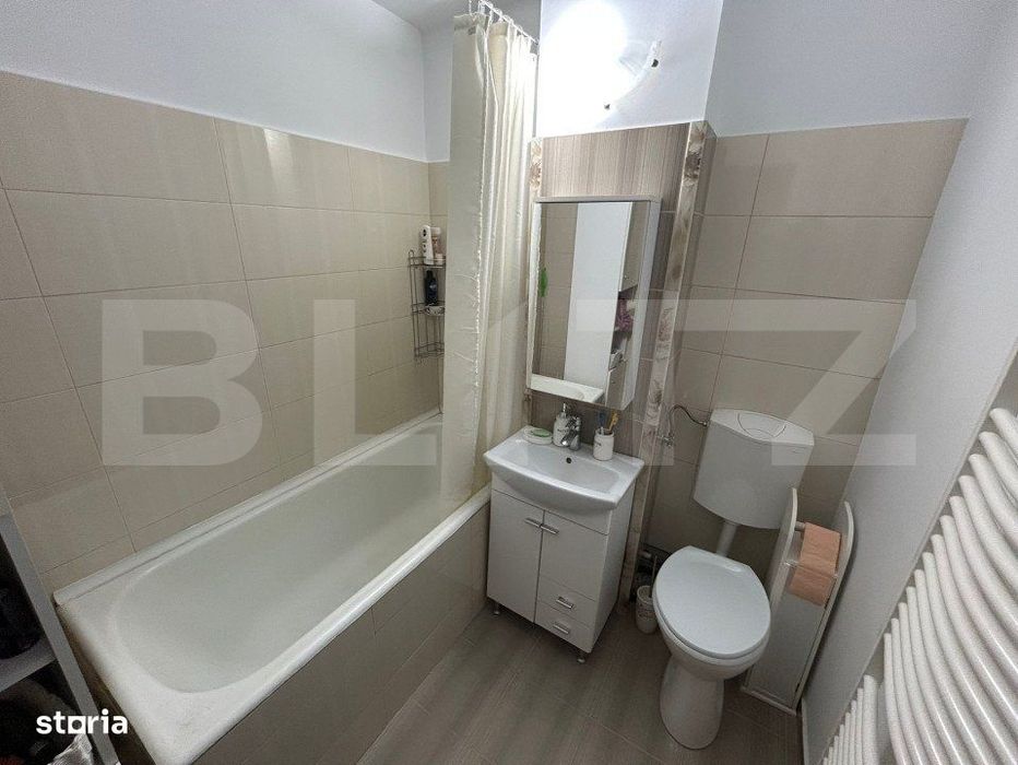 Apartament decomandat cu 3 camere,2 bai, 70 mp, zona Cetate