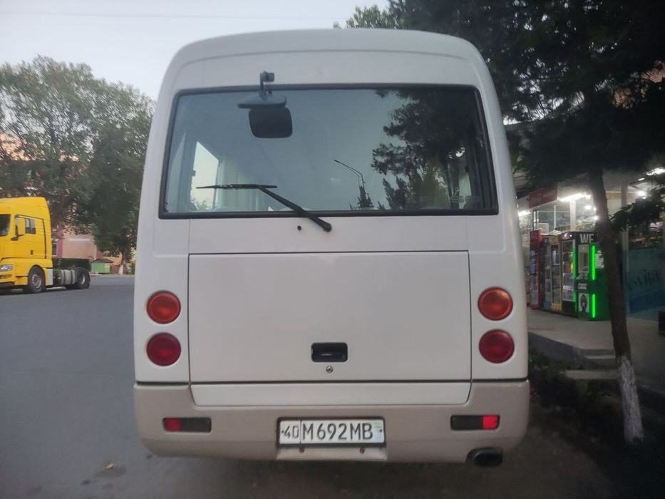 Автобус Митсубиси роза 2009 йил уриндиклар сони 28 та японский