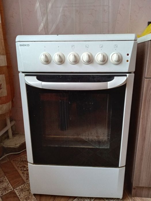 Продам комбинированную плиту BEKO