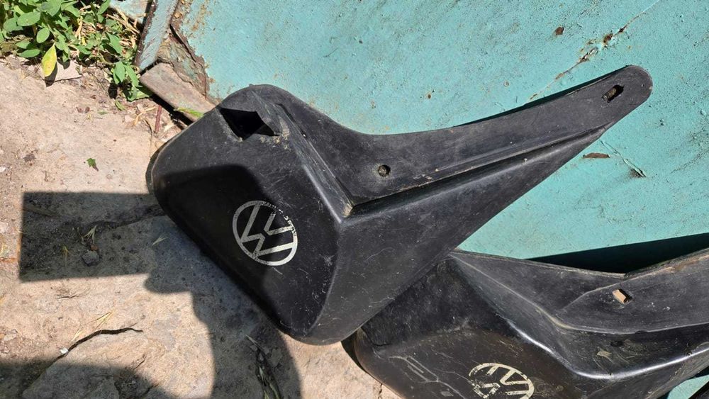 Брызговики на VW