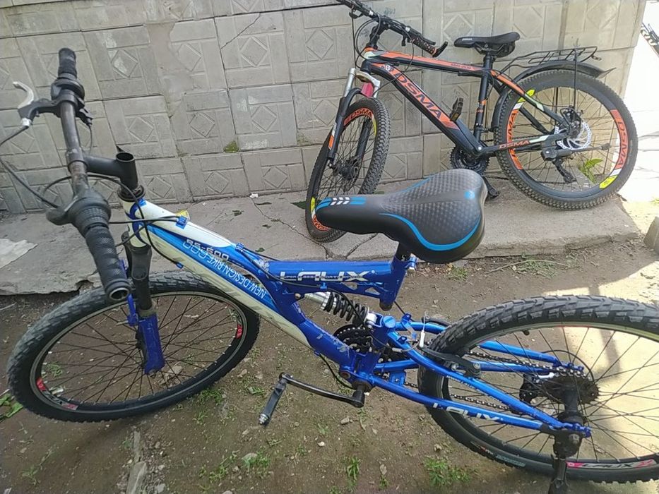 Велосипед двух подвеснный