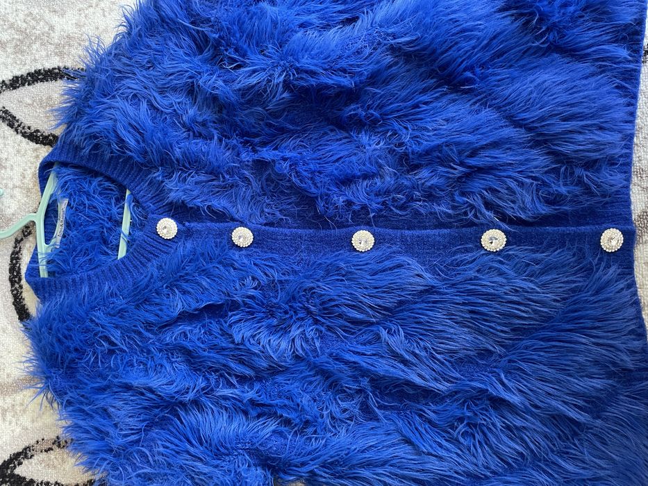 Плетена жилетка