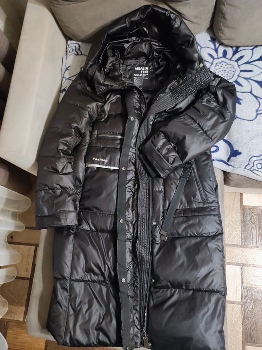 Зимний пуховик продам