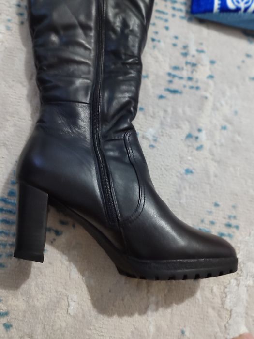 Продам кожанный натуральный сапоги.